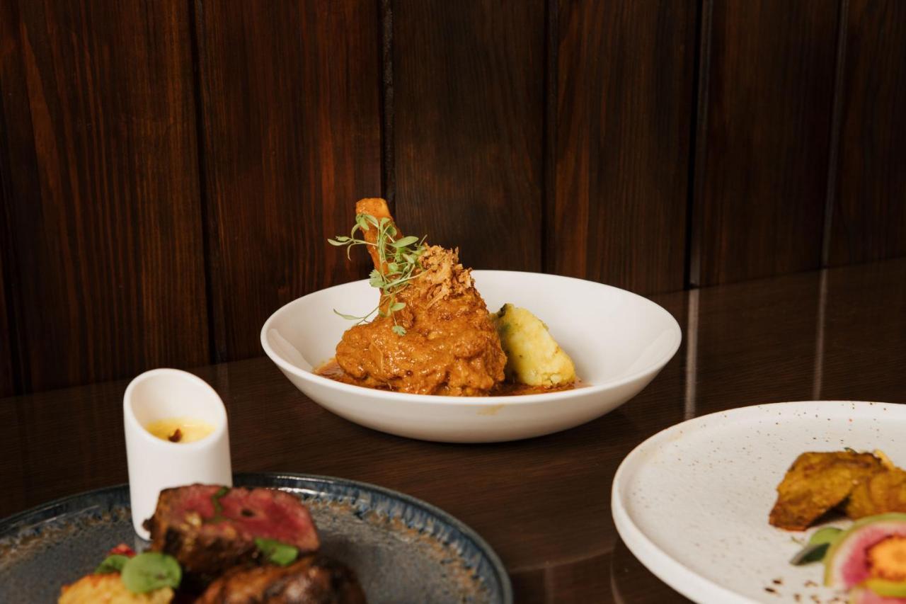 The Lalit London Hotel Ngoại thất bức ảnh A plate of chicken 65
