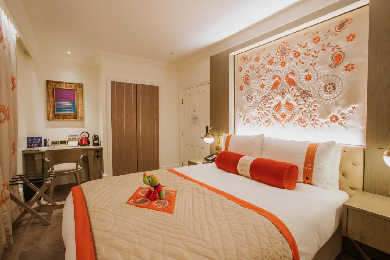 The Lalit London Hotel Ngoại thất bức ảnh A bedroom at The Taj Mahal Palace, Mumbai
